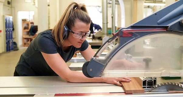 Student working with wood