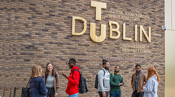TU Dublin Logo with students underneath