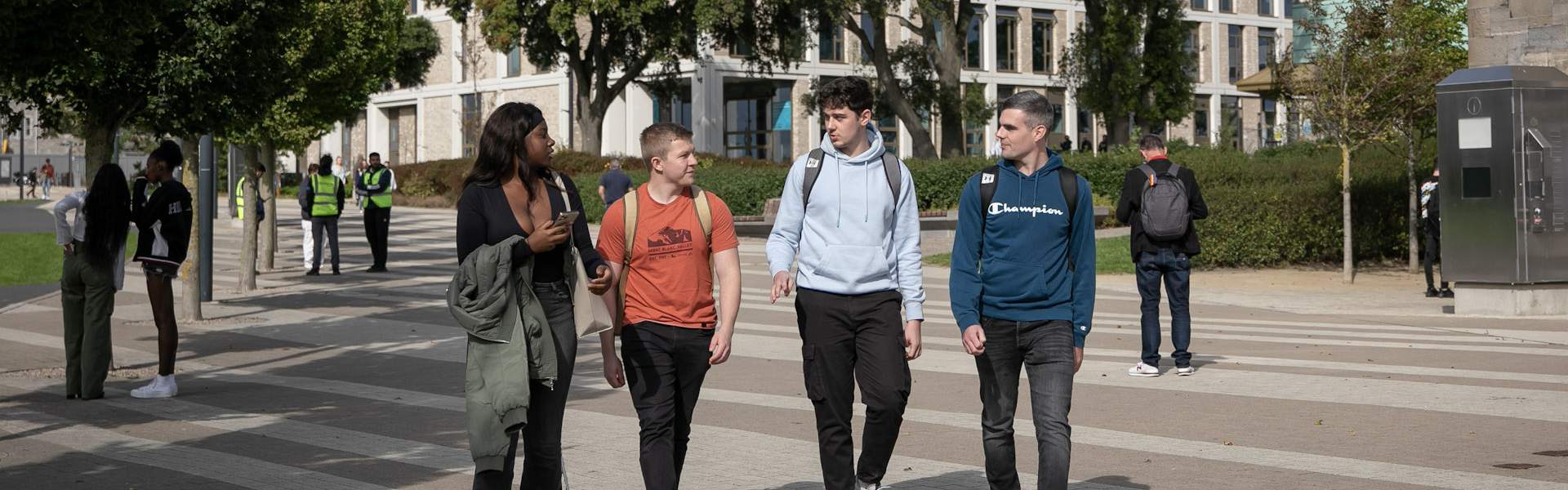 students walking across campus central quad tu dublin grangegorman