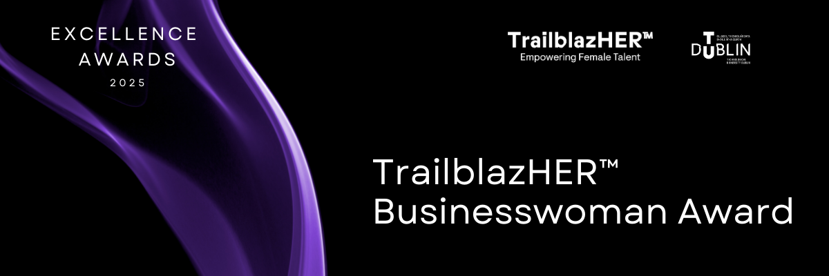 Black background with purple drape on left side with TU Dublin and TrailblazHER logos top right and the words 'Exellence Awards 2025' in bottom left corner. White font spells out TrailblazHER Businesswoman Award to the righ