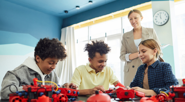 Image for Women holds a phone in her hand and looks out to her left.