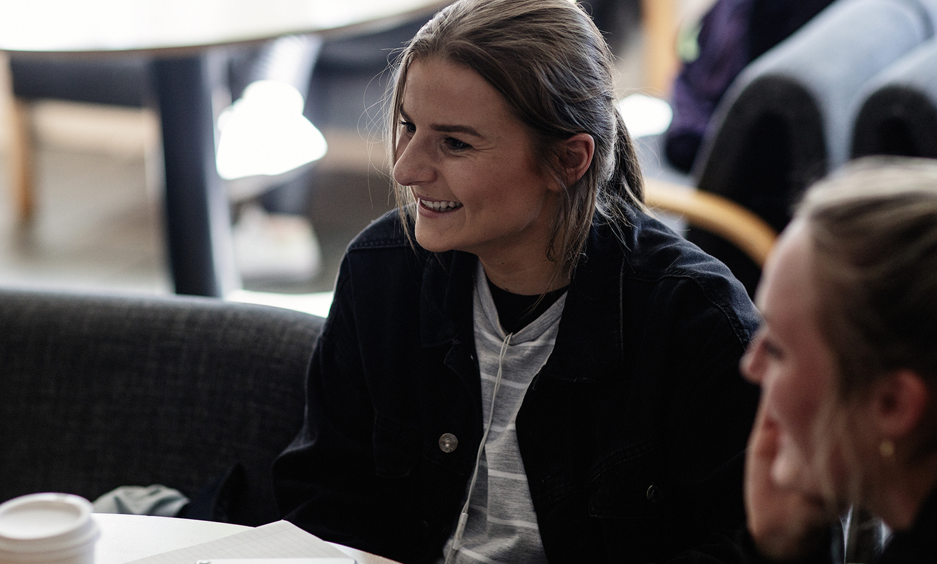 Student smiling in college