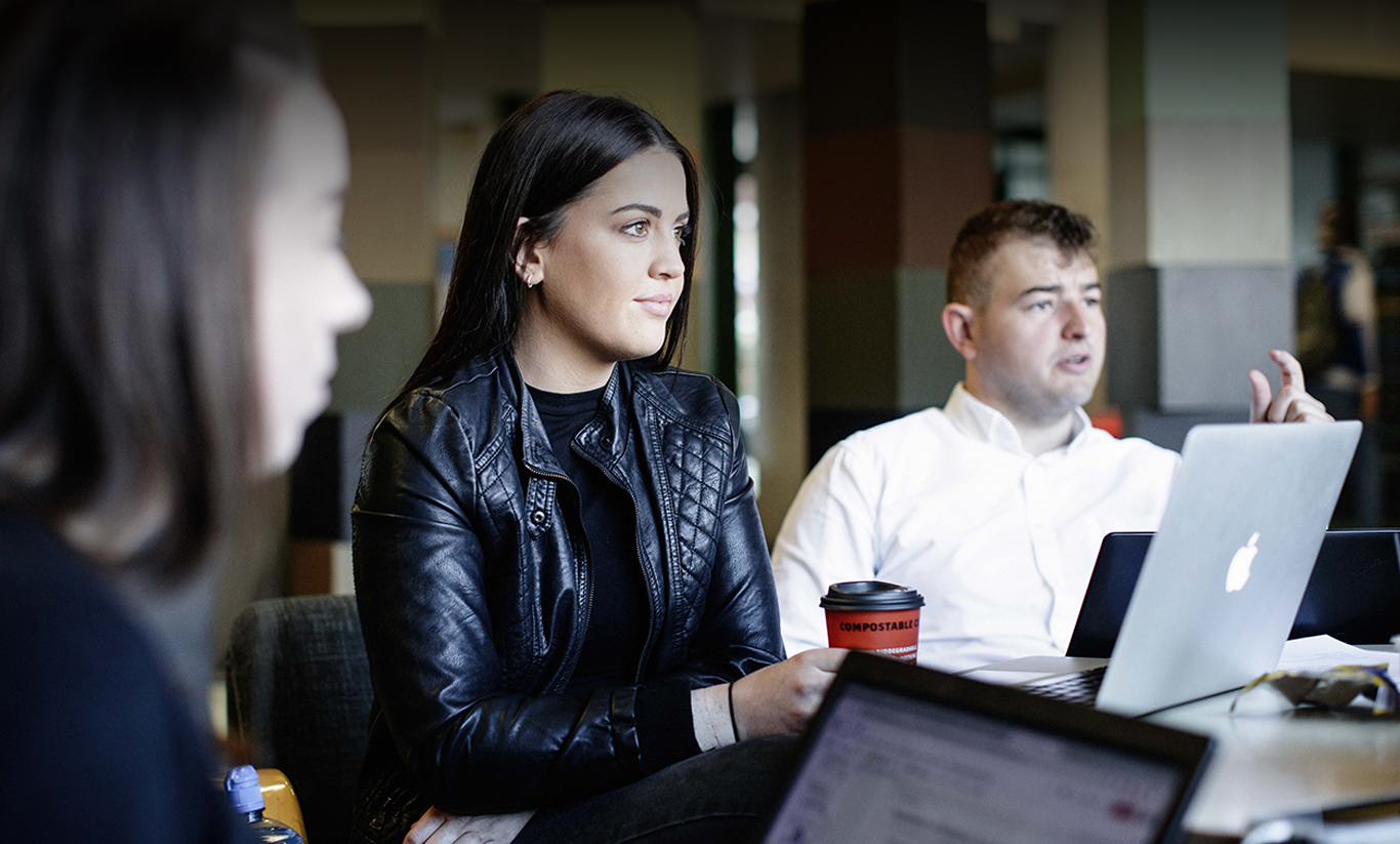 TU Dublin students sitting in conversation