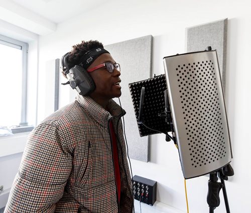 Student singing into microphone