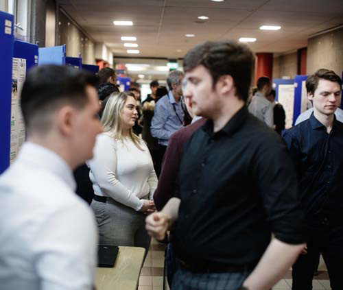 Students talking at open day