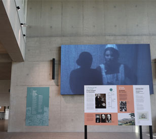 exhibition space with concrete walks and displays