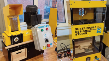 yellow machine which says sustainable design studio