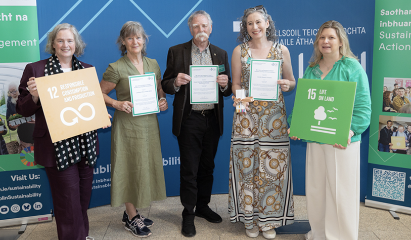 four women and a man holding certificates for the SLWC programme