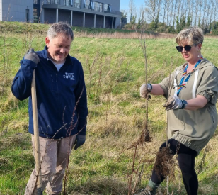 Gerrar Ryder and Linda Bennet from TU Dublin Tallaght planting a tree