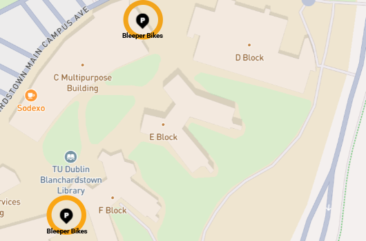 maps of blanchardstwon campus with two orange circles indicating where the designated bleeper bike parking is