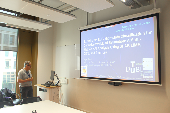 Person delivering talk with slides