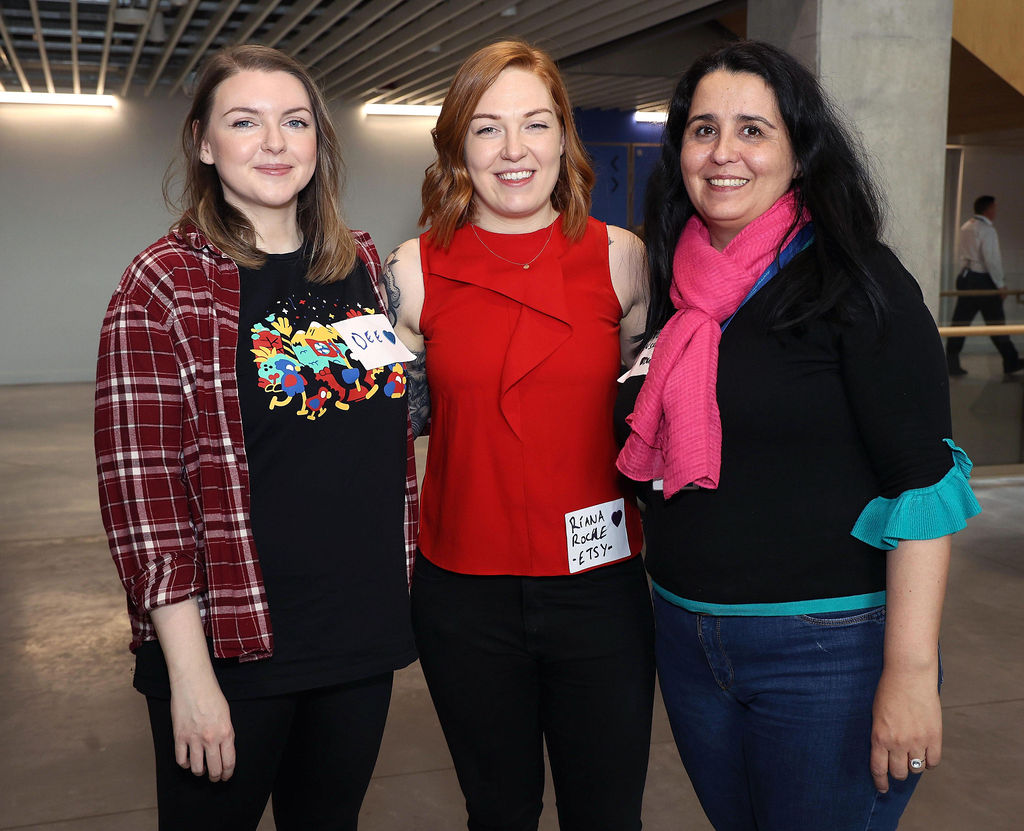 3 women posing for photo