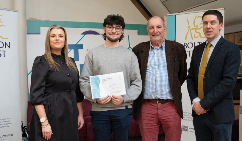 Student receiving Bolton Trust Innovation Award