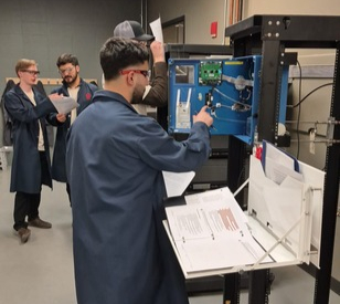 Work working on electrical panel