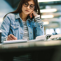 Student taking notes