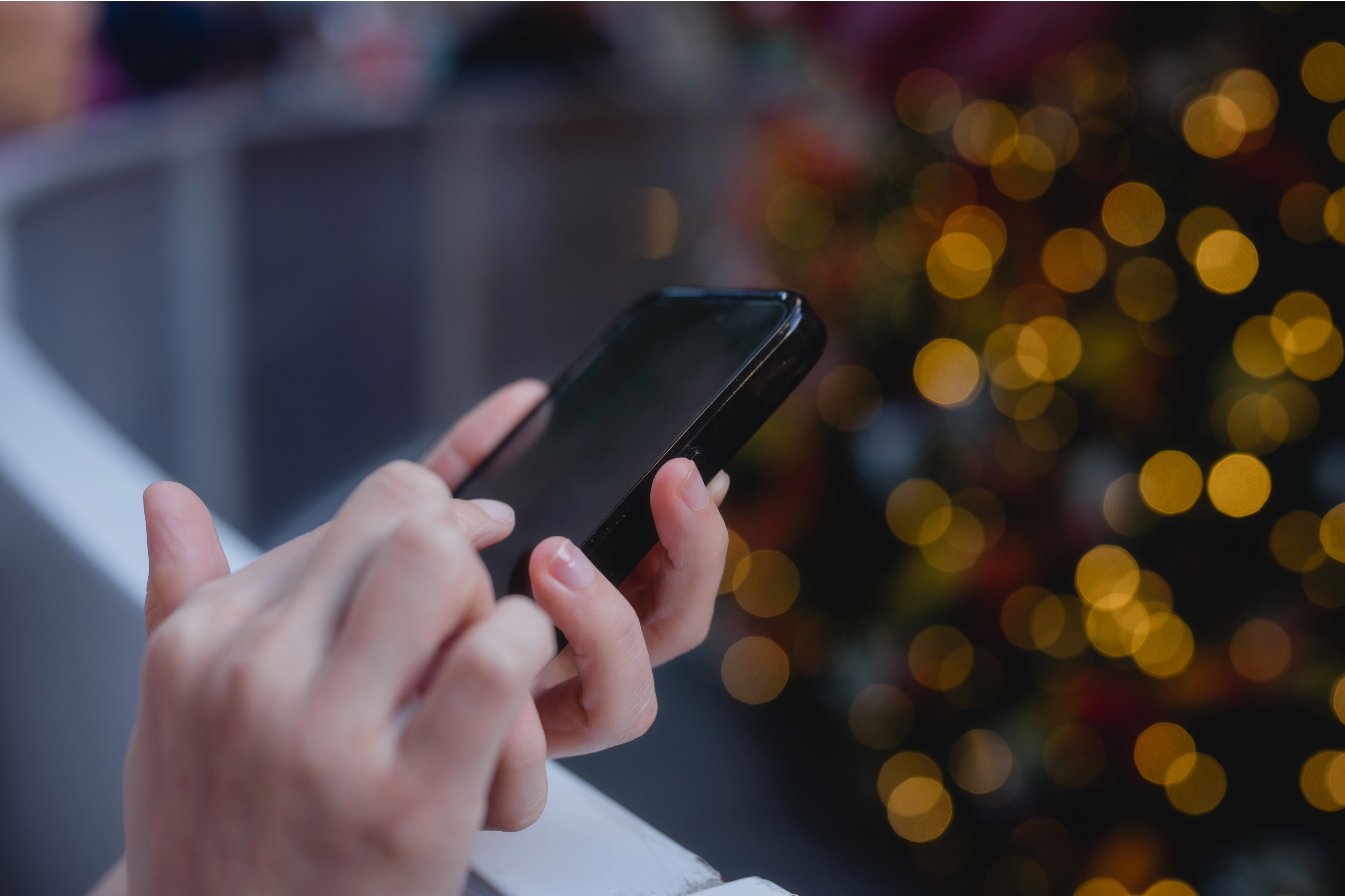hands holding a mobile phone