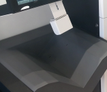 The v-shaped rest of a library self-check machine