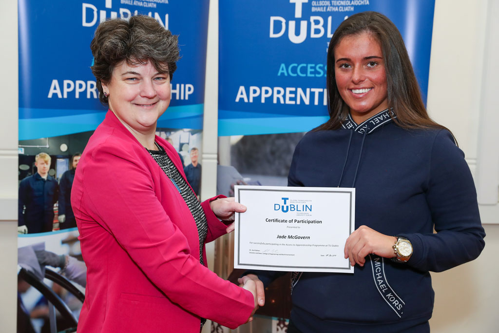 Dr. Avril Behan, Director and Dean of the College of Engineering and Built Environment, congratulatingJade McGovern, graduate of the Access to Apprenticeship programme.