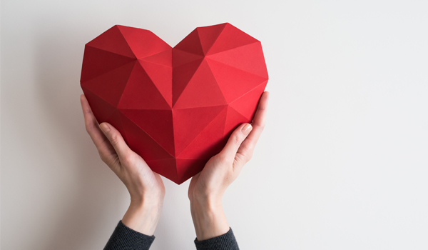 Hands holding a love heart