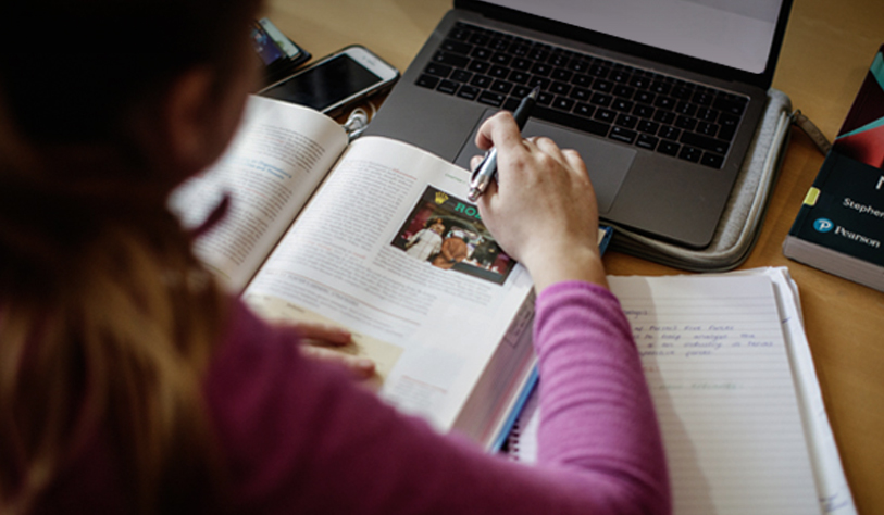 A student working on laptop