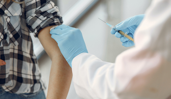 Photo of person receiving vaccine