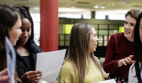 Students laughing in classroom