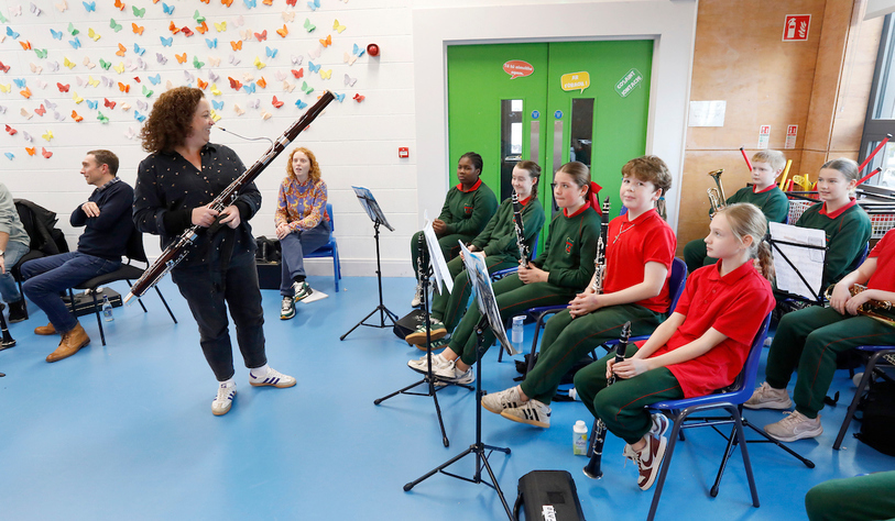 Students playing instruments at a workshop