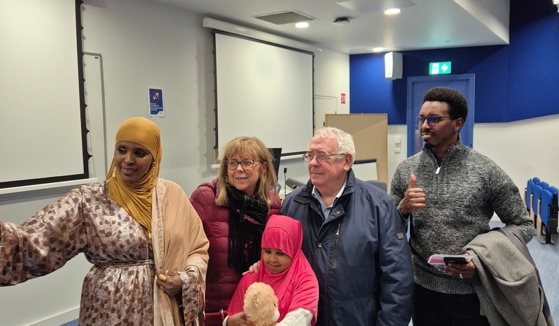 A group of people take a selfie