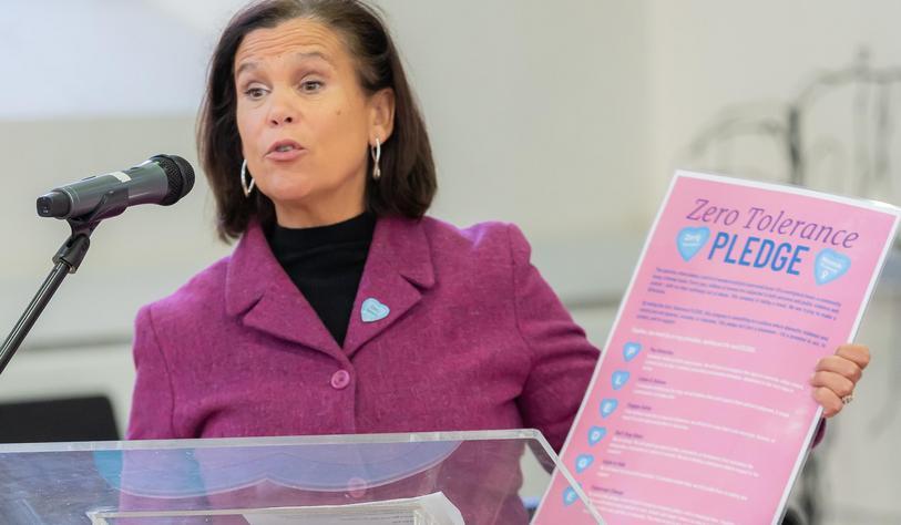 Mary Lou McDonald TD holds the Zero Tolerance Pledge