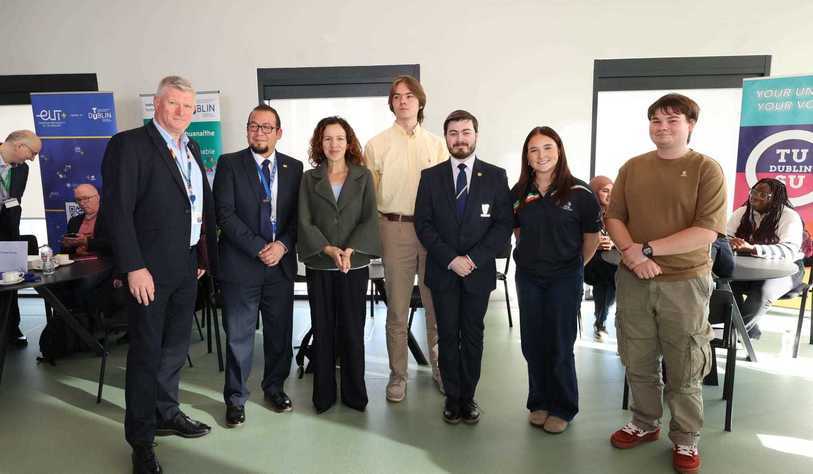 A group of people pose for a photo