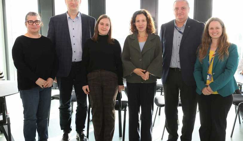 A group of people pose for a photo