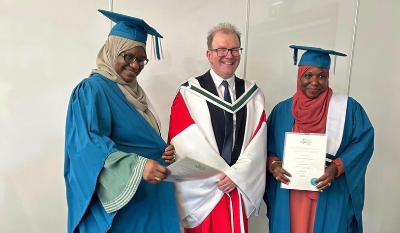 Certificate in Arts in Intercultural Community Development graduates celebrate receiving their certs