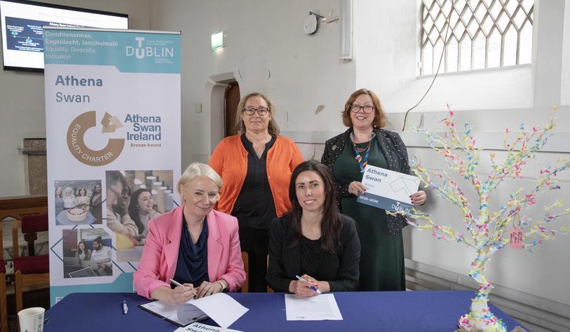 Dr Deirdre Lillis, President of TU Dublin signs the Athena Swan Charter Principles with members of the EDI team at TU Dublin