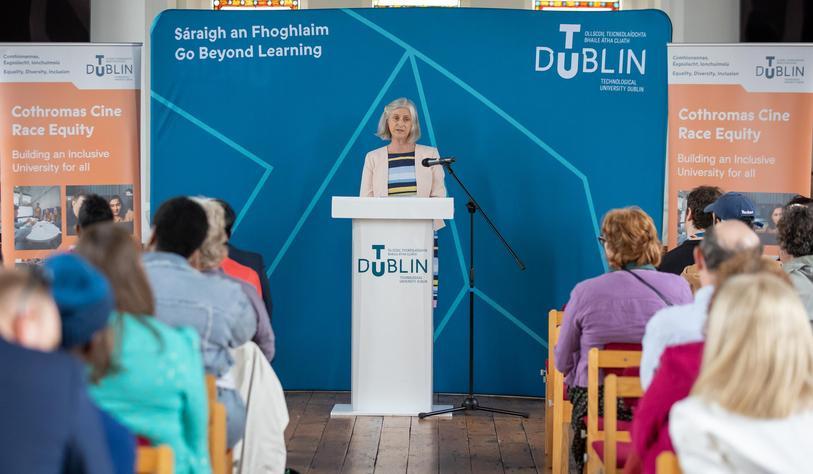 A person speaking at an event