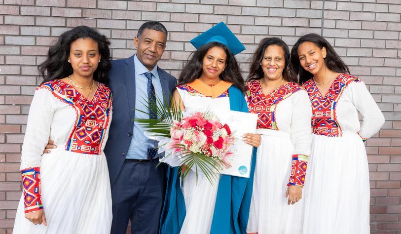 A student celebrating their graduation