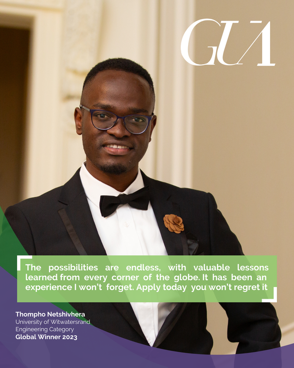 An image of a person wearing a black tie suit