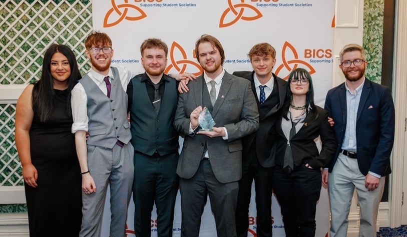 Photo of students celebrating an award