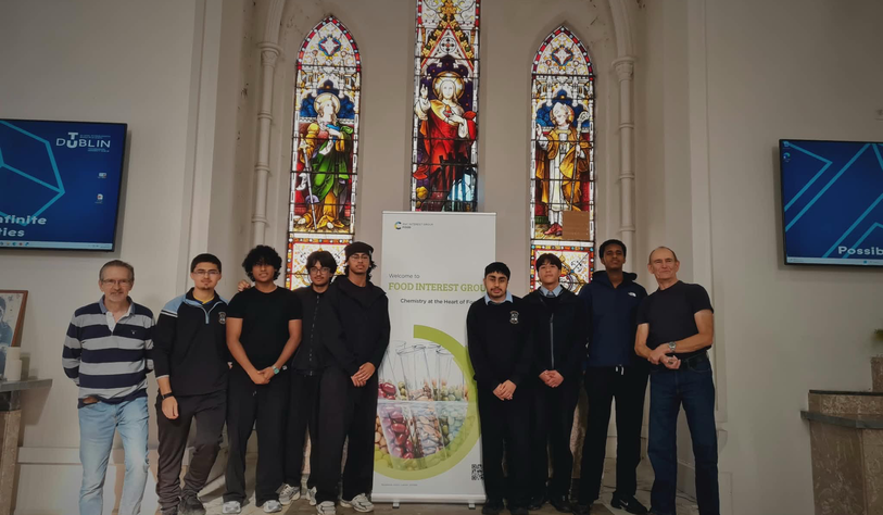 Participants and organisers pose for a group photograph at the Future of Food event, in front of the Food Interest Group banner at TU Dublin.