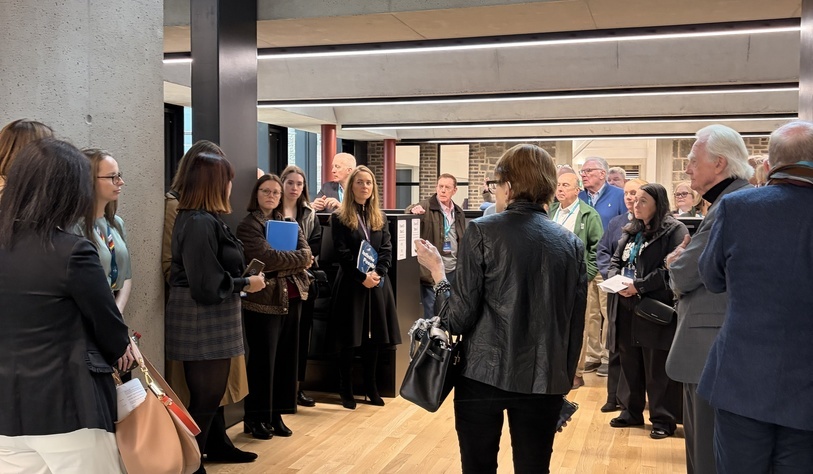Members of the Irish American Partnership visit TU Dublin’s Grangegorman campus, listening to a guide during a tour of the university’s facilities.