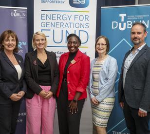 Five people pose for a group photo at the TU Dublin and ESB TrailblazHER Scholarship launch, standing in front of TU Dublin and ESB “Energy for Generations Fund” branding.