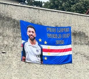 Banner on a textured gray wall featuring a smiling man in a sports shirt. Text reads 