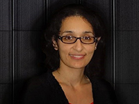 Photo of a smiling woman.