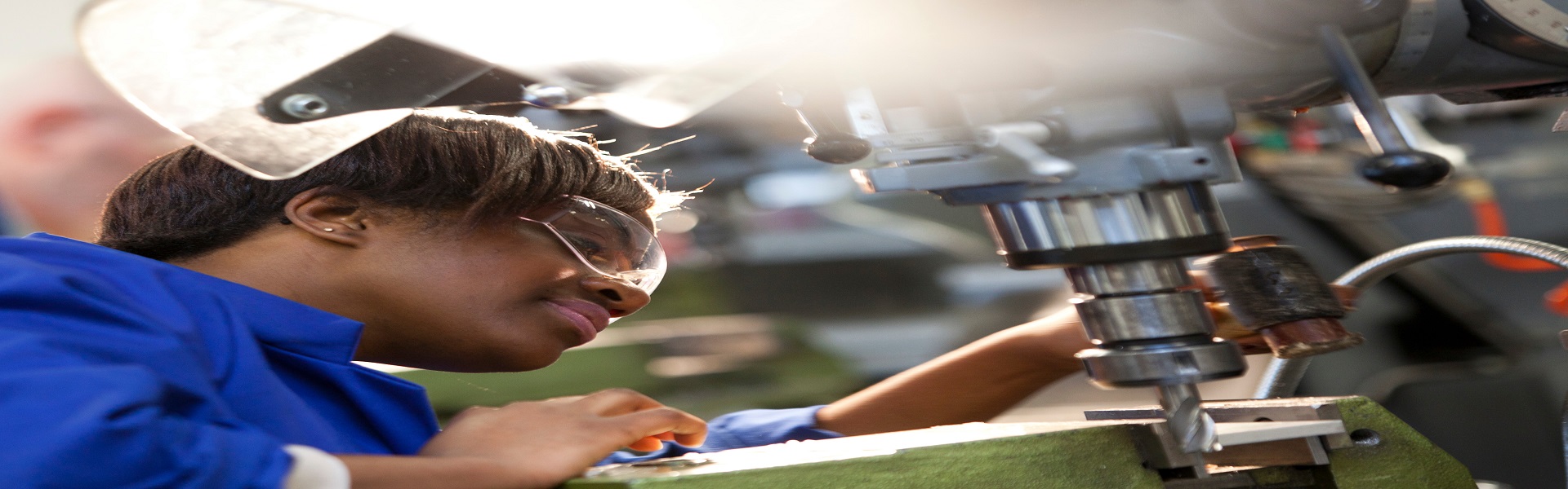 girl doing Metalwork