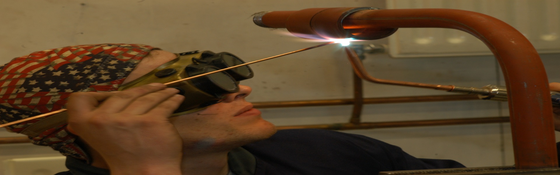 Man welding a pipe