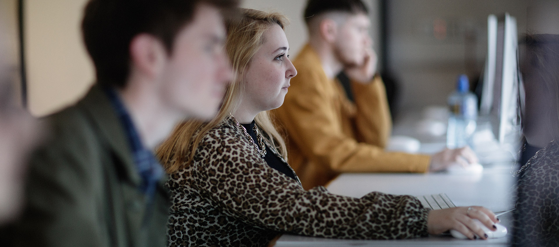 Students studying at computers