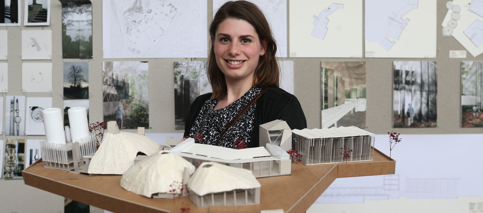 Student with architecture pieces