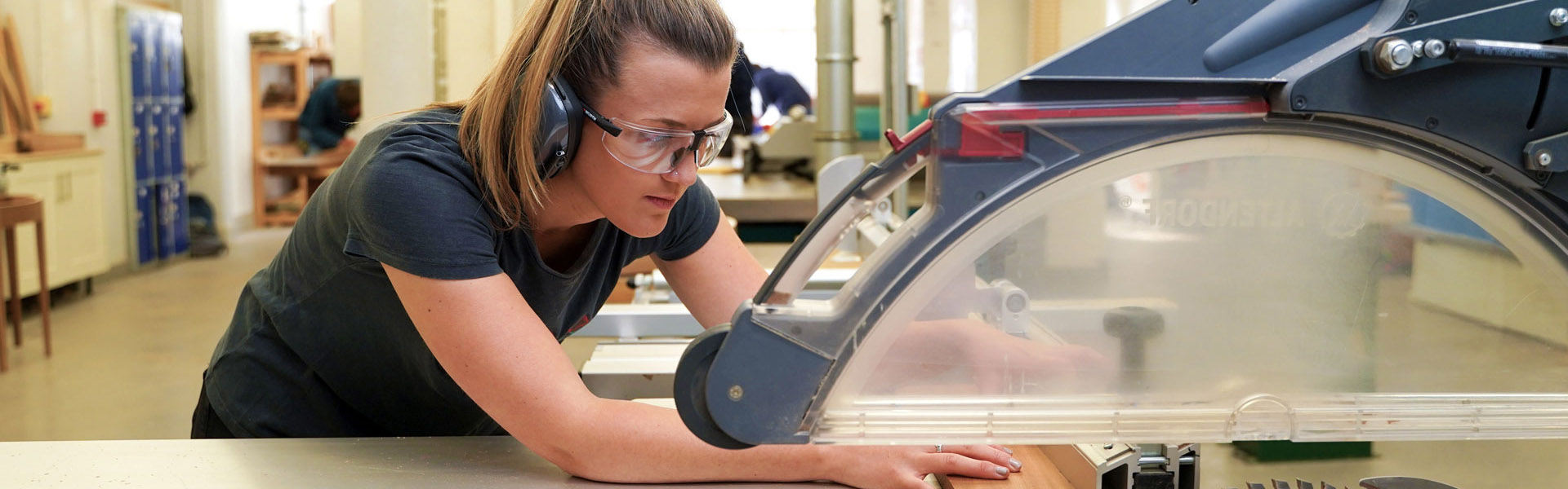Student cutting wood